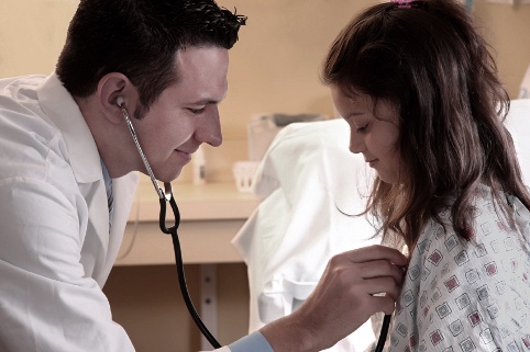 Doctor and Girl. Health Care in America.